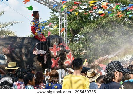 Ayutthaya Thailand April 14, 2019 : Elephant Splashing Water Between Tourist In Songkarn Festival