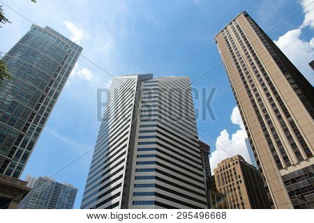Chicago, Usa - June 27, 2013: Crain Communications Building (middle) In Chicago. It Is 582 Ft (177 M
