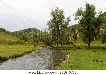 The Mountain River Yarovka In The Village Of Generalka Of The Altai Territory. Western Siberia. Russ