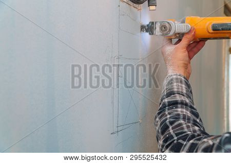 Cutting Plasterboard Plaster Drywall Hand With Electro Saw