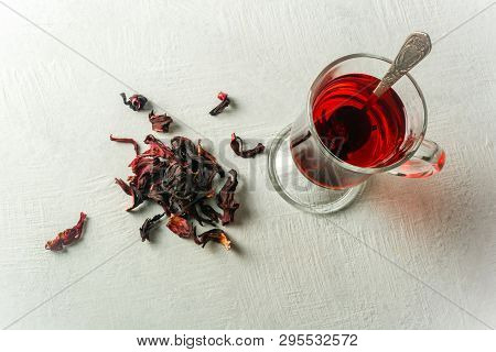Transparent Glass Cup With Hot Red Tea From Hibiscus Or Hibiscus.