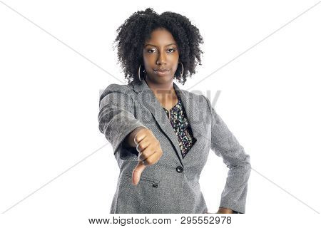 Black African American Female Businesswoman Isolated On A White Background Gesturing Thumbs Down