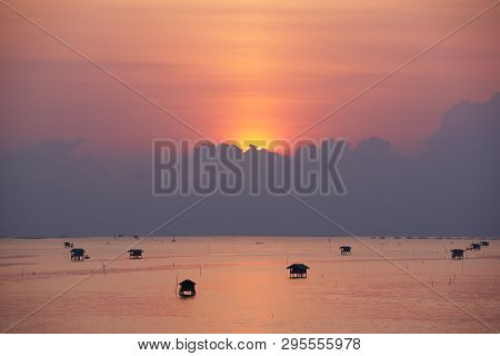 Beautiful Sunrise Behind The Clouds Over The Gulf Of Thailand, Bangtaboon, Petchaburi,thailand
