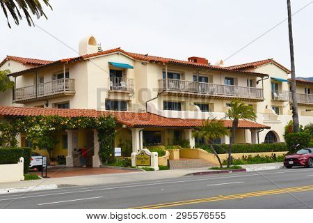 SANTA BARBARA, CALIFORNIA - APRIL 11, 2019: The Harbor View Inn, a family friendly resort style hotel across from West Beach and historic Stearns Wharf.