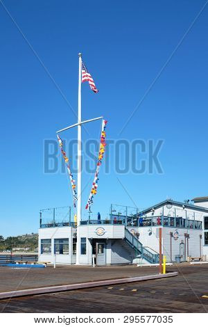 SANTA BARBARA, CALIFORNIA - APRIL 12, 2019:  Longboards Grill on Stearns Wharf, a family-friendly eatery serving burgers, fish and chips, clam chowder, and more.