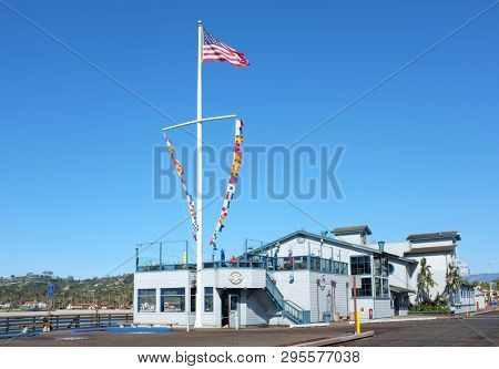 SANTA BARBARA, CALIFORNIA - APRIL 12, 2019:  Longboards Grill on Stearns Wharf, a family-friendly eatery serving burgers, fish and chips, clam chowder, and more.