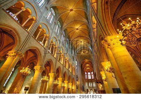 Paris, France - July 1, 2017: Interior Colonnade Panorama Of Notre Dame Gothic Cathedral Left Side N