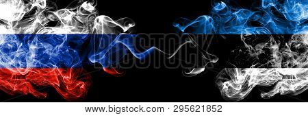 Russian Vs Estonia, Estonian Smoke Flags Placed Side By Side. Thick Colored Silky Smoke Flags Of Rus