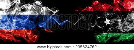 Russian Vs Libya, Libyan Smoke Flags Placed Side By Side. Thick Colored Silky Smoke Flags Of Russia 