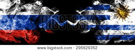 Russian Vs Uruguay, Uruguayan Smoke Flags Placed Side By Side. Thick Colored Silky Smoke Flags Of Ru
