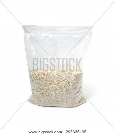 Oat Flakes. Transparent Bag Packing Of Cereal Oat Flakes.