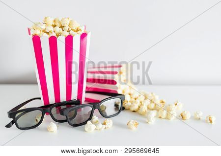 Cinema And Date Concept - Close Up Of Two Striped Boxes With Popcorn, 3d Glasses And Copy Space Over