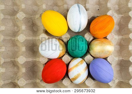 Happy Easter Card. Colorful Easter Eggs On Carton Background. Copy Space For Text.