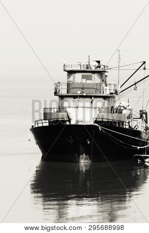 Large Fish Processing Boat In The Deep Water Dock. Photo