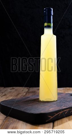 Limoncello In A Bottle With Space For Labels And Text. Traditional Italian Lemon Liqueur. Alcohol On