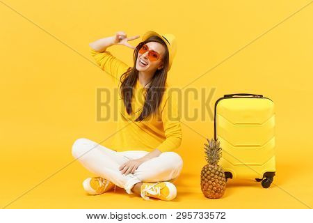 Traveler Tourist Woman In Summer Clothes Showing Victory Sign Sit Near Pineapple Fruit Isolated On Y