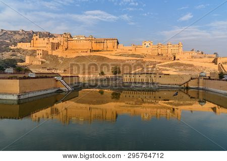 Amber Fort And Palace In Maotha Lake At Morning. Jaipur. Rajasthan. India