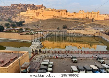 Amber, India - January 31, 2019: Amber Fort And Palace In Maotha Lake At Morning. Jaipur. Rajasthan