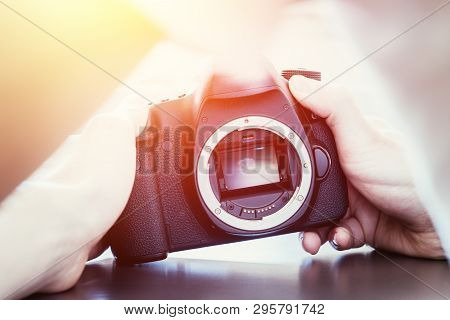Photographer Is Using A Professional Camera, Open Sensor And Sunlight