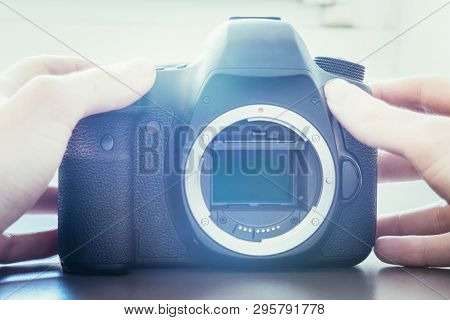 Photographer Is Using A Professional Camera, Open Sensor
