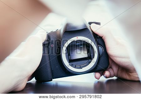 Photographer Is Using A Professional Camera, Open Sensor