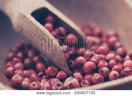 Pink Peppercorn In A Bowl With Scooop