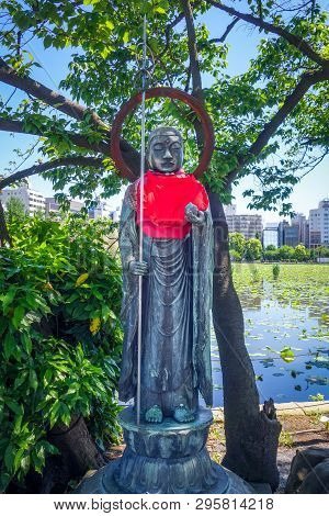 Jizo Statue At Shinobazu Pond In Ueno, Tokyo, Japan