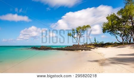 The Sand Beach Of Île Aux Cerfs, A Small Island Close Off The East Coast Of Mauritius.