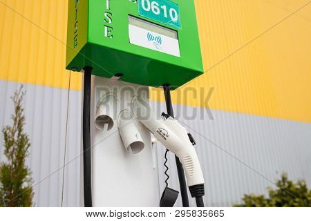 Kiev, Ukraine - April 17, 2019: Electric Vehicle Charger On Highway Parking Lot Future Of Personal T