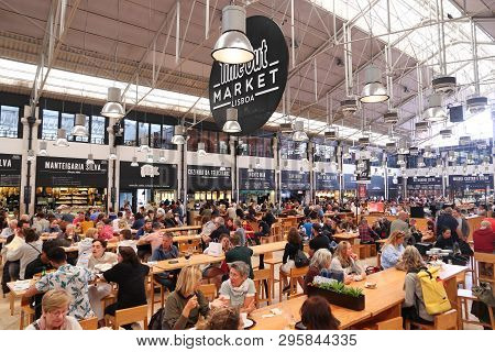 Lisbon, Portugal - June 6, 2018: People Eat At Timeout Market In Lisbon, Portugal. Timeout Market Is