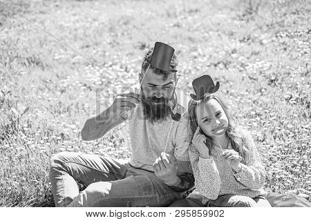 Aristocrates Concept. Family Spend Leisure Outdoors. Dad And Daughter Sits On Grass At Grassplot, Gr