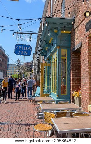 Fells Point, Baltimore, Md, Usa -- April 13, 2019. Tourists And Shoppers Walk Along Thames St In His