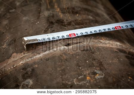 Damage Measurement. Fuel Line. Defect - A Crack In The Pipeline Pipe. Photographed In Ukraine. Kiev 