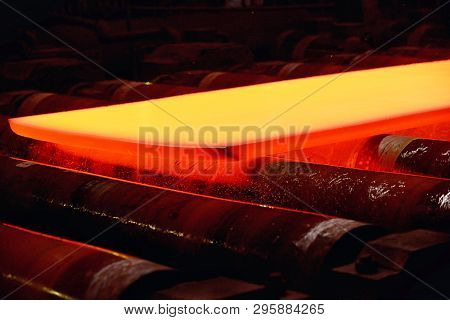 Industrial Hot Steel Coil On Conveyor In Steel Plant