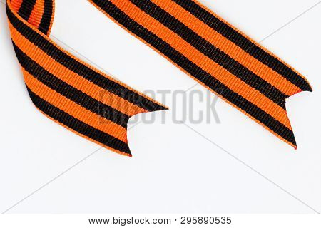 Bant Of Black And Orange Ribbons Of St. George Isolated On White Background