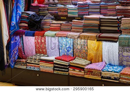 Dubai, Uae, January 13, 2019: A Lot Of Beautiful Handmade Pashmina Shawl Are On The Shop Counter