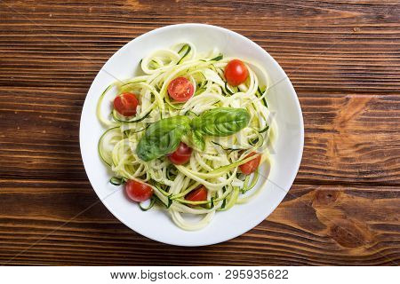 Zucchini Pasta Noodles With Tomatoes . Healthy Vegetarian Food