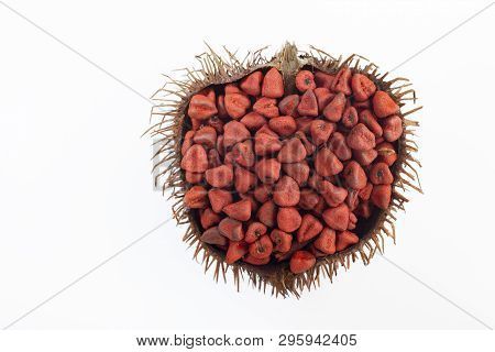 Annatto Seeds On White Background, Top View