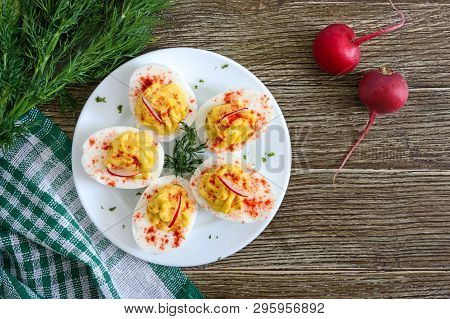 Deviled Eggs. Delicious Appetizer. Boiled Eggs Stuffed With Yolk, Mustard, Mayonnaise, Paprika. Clas