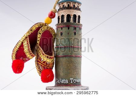 Turkish Footware On The Galata Tower In The View