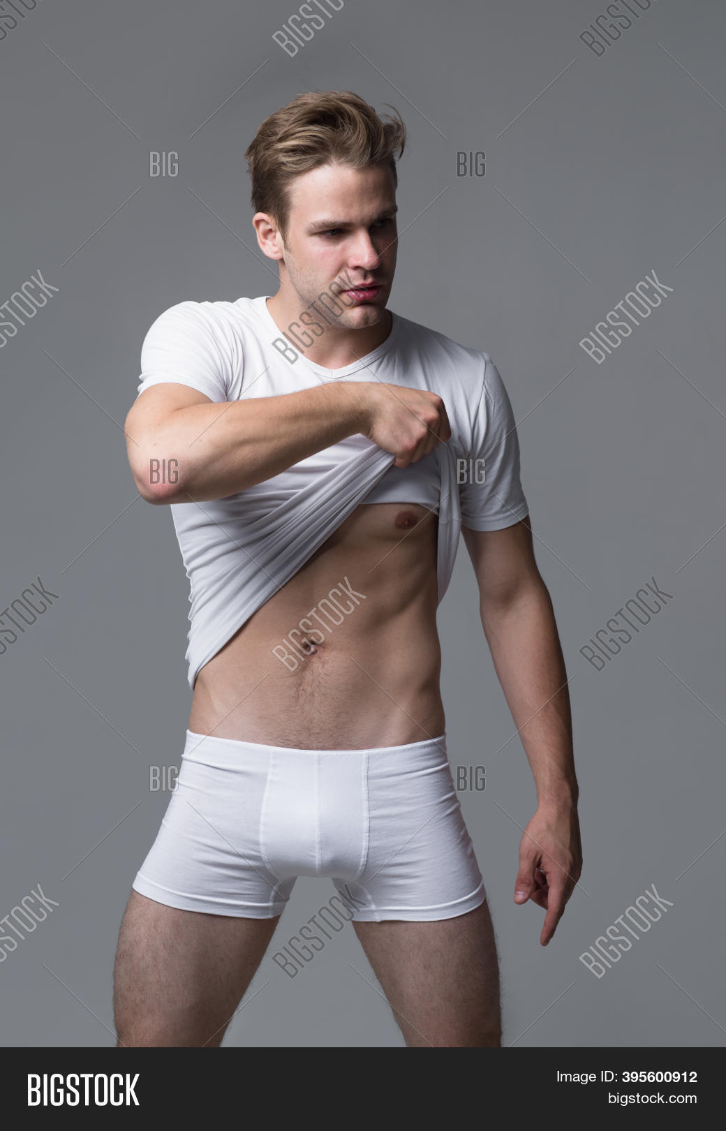 Premium Photo  Naked man man take off shirt sexy macho nude mens underware  sexy man in boxer shorts