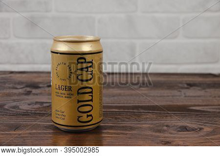 An Old Aluminium Can Of Redruth Brewery Beer Against The Brick Wall