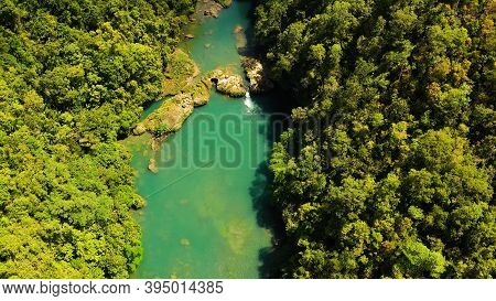 River In The Rainforest In A Mountain Canyon. Loboc River In The Green Jungle. Bohol, Philippines.