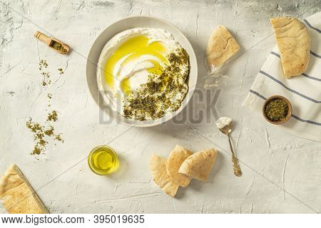 Popular Middle Eastern Appetizer Labneh Or Labaneh, Soft White Goat Milk Cheese With Olive Oil, Hyss