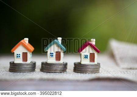 Mini House On Stack Of Coins,money And House, Real Estate Investment, Save Money With Stack Coin, Mo