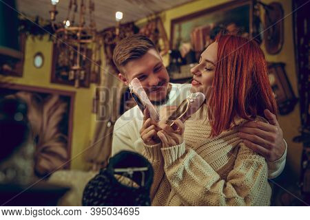 Shoe. Smiling Family, Caucasian Couple Looking For Home Decoration And Holidays Gifts In Household S