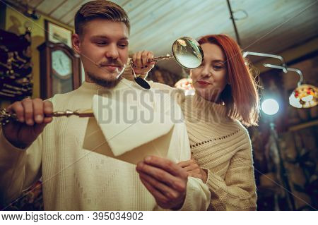 Waxed Envelope. Smiling Family, Couple Looking For Home Decoration And Holidays Gifts In Household S