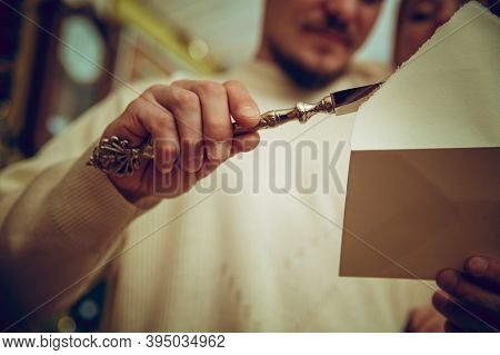 Waxed Envelope. Smiling Family, Couple Looking For Home Decoration And Holidays Gifts In Household S