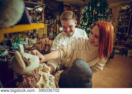 Handmade. Smiling Family, Caucasian Couple Looking For Home Decoration And Holidays Gifts In Househo