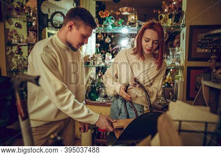 Having Fun. Smiling Family, Caucasian Couple Looking For Home Decoration And Holidays Gifts In House